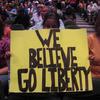 A fan cheers on the WNBA's New York Liberty